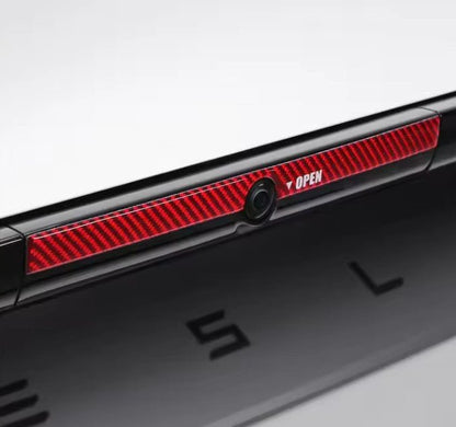 Carbon Fiber Trunk Button Trim Red or Black for Tesla Model Y Juniper 2025 Onwards - TESLARY Buy Tesla Shop Accessories Europe Nederlands Dublin Cork Ireland Deutschland Espana Iceland Finland France Italia